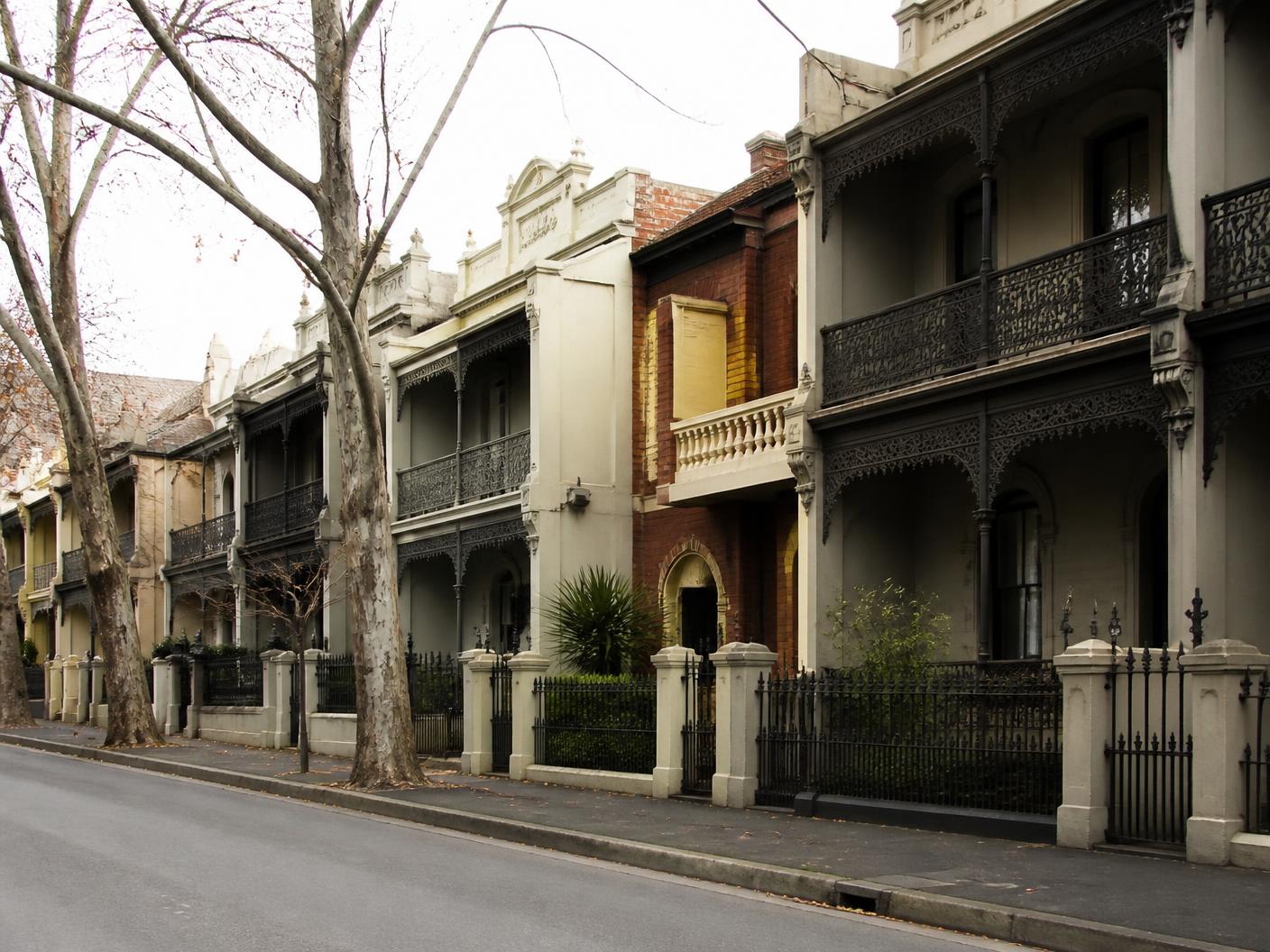 Row of Victorian terrace houses with cast-iron lacework in inner Melbourne